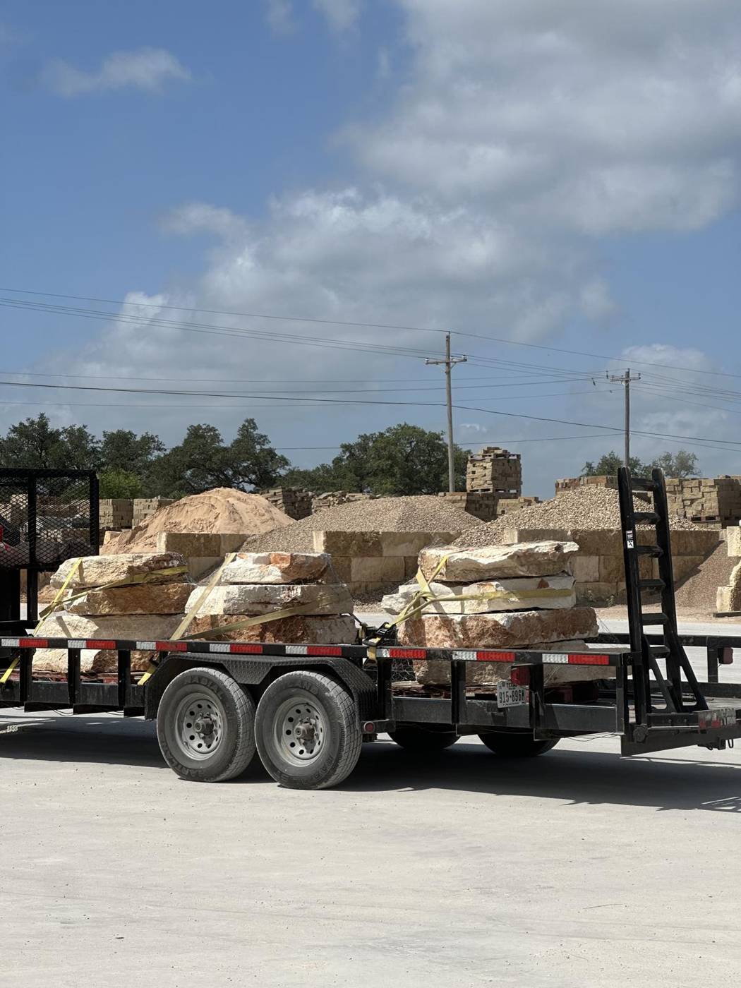 Trailer loaded with limestone blocks for delivery to a job site